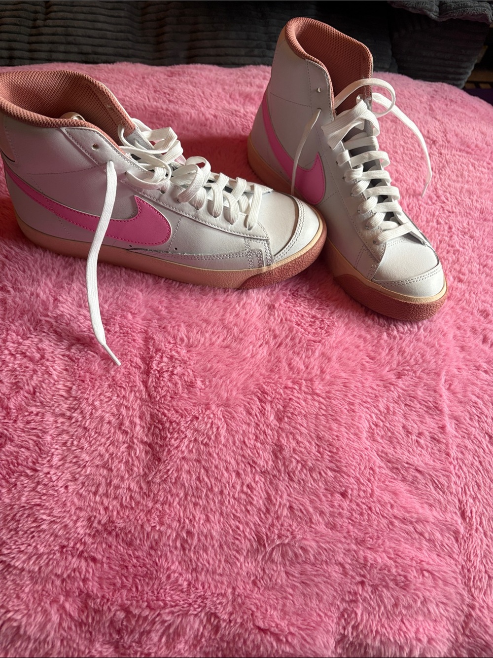 Nike Women’s White High-Top Sneakers with Pink Swoosh